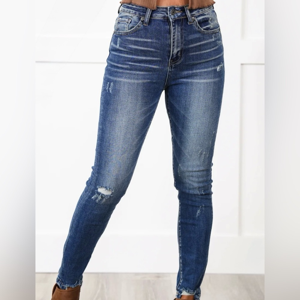 Risen Medium Wash Distressed Skinny Jeans